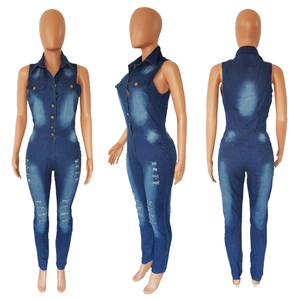 Detail view of sleeveless distressed denim jumpsuit with metal buttons and chest pockets