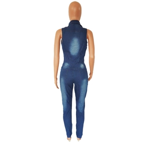Detail of slim fit sleeveless denim jumpsuit showing back wash and pockets