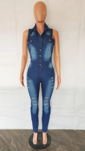 Detail view of sleeveless distressed denim jumpsuit with metal buttons and ripped legs