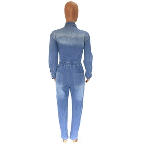 Back view of slim fit denim jumpsuit featuring elastic high waist and dual rear pockets