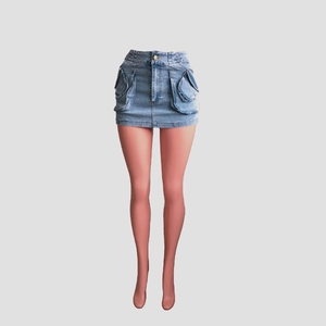 Detail of cargo-style denim mini skirt in washed blue with large utility flap pockets