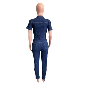 Detailed back view of slim-fit denim jumpsuit with short sleeves and white contrast stitching