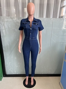 Detailed front view of a slim-fit dark blue denim jumpsuit with short sleeves and collar