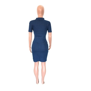 Rear view of slim-fit dark blue denim mini dress featuring functional back pockets