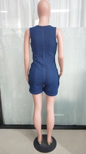 Rear view of slim denim playsuit featuring white contrast stitching and sleeveless cut