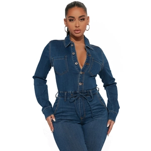 Slim fit dark blue long sleeve denim jumpsuit with metal buttons and drawstring waist