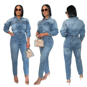 Women's blue long sleeve denim jumpsuit with elastic waist and cargo pockets