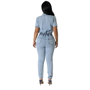 Slim fit light blue denim jumpsuit with elastic waist and back pockets from behind