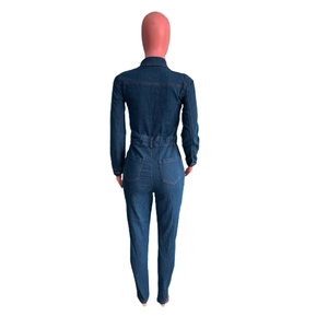 Back view of slim fit dark blue denim jumpsuit with long sleeves and rear pockets