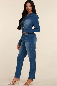Detail of classic dark blue denim jumpsuit featuring double-breasted buttons and lapel collar