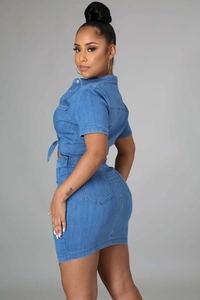 Slim fit denim two-piece set featuring short sleeve tie-front top and bodycon mini skirt
