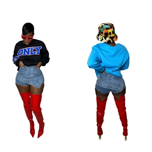 Women's casual fashion set with black sweatshirt and light blue denim mini skirt