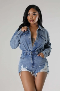 Front view of light blue denim romper featuring distressed fringe and elastic waist details