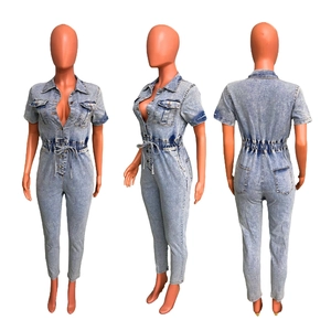 Slim fit light blue denim jumpsuit with elastic waist and drawstring detail