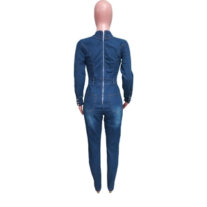 Rear view of denim jumpsuit featuring long silver back zipper and practical pockets