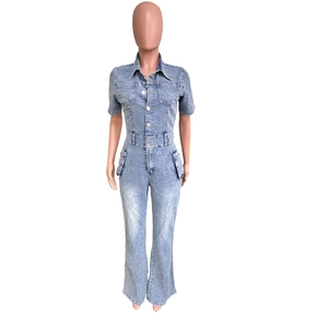 Close-up of light blue denim jumpsuit with lapel collar, buttons, and utility pockets