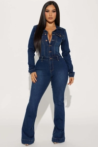 Detailed view of dark blue long sleeve denim jumpsuit with button pockets and slim fit waist