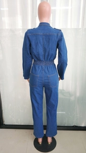 Back view of long sleeve denim jumpsuit with elastic waist and dual rear pockets