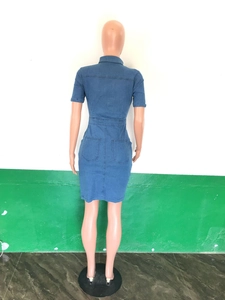 Detailed back view of a slim-fit blue denim midi dress with pockets and waist stitching