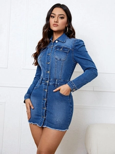 Detailed view of long sleeve denim mini dress with buttons and distressed hem finish