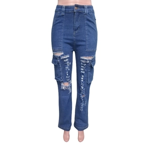 Close-up of distressed denim details with cargo pockets and vintage ripped texture