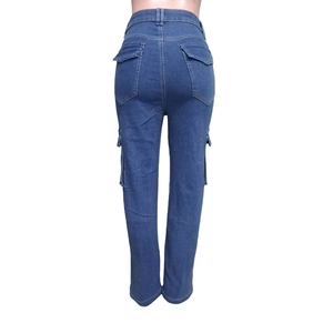 Rear view of mid-blue high-waisted cargo jeans with flap pockets and straight-leg cut