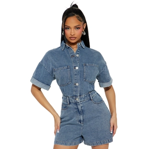 Detail of high-stretch washed denim short sleeve jumpsuit with utility pockets