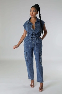 Detail of dark blue denim sleeveless jumpsuit with drawstring waist and cargo pockets