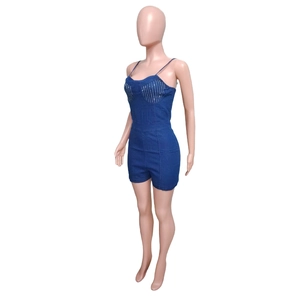 Detailed view of blue denim bodysuit featuring white striped bodice and thin straps