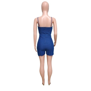 Rear view of slim fit denim romper with thin straps and a central zipper closure