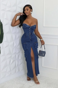 Detail of a strapless denim maxi dress with cargo pockets and a high slit feature
