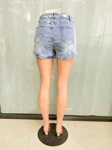 Rear view of light blue denim shorts showing symmetrical pockets and belt loops