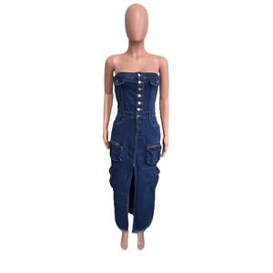 Detail of dark blue denim strapless dress with utility pockets and front slit design