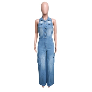 Detail of light blue washed denim cargo jumpsuit with metal buttons and chest pockets