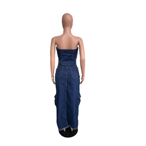 Detail view of denim strapless maxi dress with cargo pockets and raw hem back design