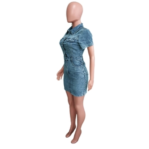 Side view of slim fit denim mini dress featuring button-down front and washed blue finish