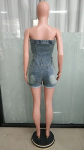 Back view of slim fit denim tube romper featuring classic rear pockets and belt loops