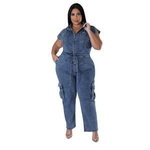 Detail of short sleeve denim jumpsuit with drawstring waist and cargo pockets