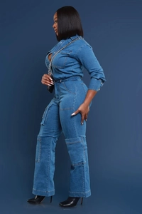 Detailed view of women long sleeve denim jumpsuit with cargo pockets and utility design