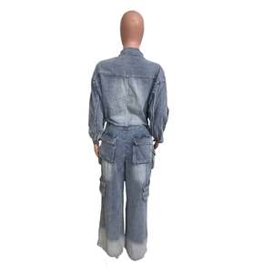 Rear view of washed blue denim boilersuit featuring elastic waist and utility pockets