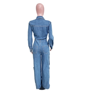 Rear view of long sleeve denim jumpsuits with elastic waist and cargo side pockets