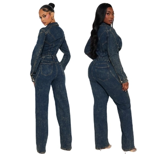 Rear view of deep blue denim jumpsuit with long sleeves and symmetrical back pockets