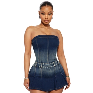 Deep blue washed denim tube top and high waist pleated skirt set on model