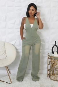 Detail of sage green halter neck denim jumpsuit with open back and wide leg cut