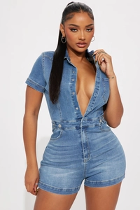 Close-up of slim fit washed blue denim romper featuring lapel collar and metal buttons