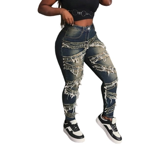 Jeans skinny bleu pour femme avec détails déchirés et patchs à franges élégants