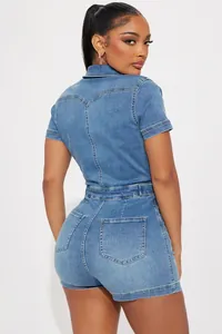 Detail view showing back double pockets and high-waist fit of blue denim romper