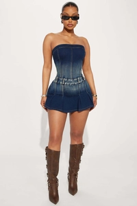 Detail view of bodycon gradient denim tube dress with cinched waist and pleated hem