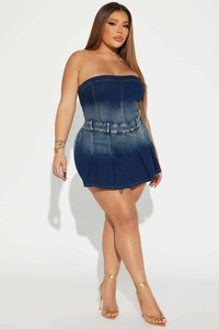 Detail of gradient blue denim tube dress with pleated hem and slim high waist fit