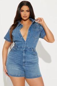 Detailed close-up showing the premium washed denim texture and buttons of the romper